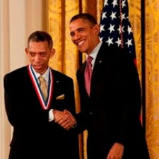 George Carruthers shakes hands with President Barack Obama