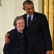 Edith M. Flanigen poses with President Barack Obama