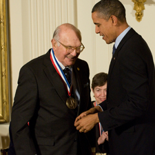Harry Coover shakes hands with President Barack Obama