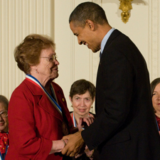 Helen Free shakes hands with President Barack Obama