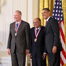 IBM Team members Rangaswamy Srinivasan and James Wynne pose with President Barack Obama