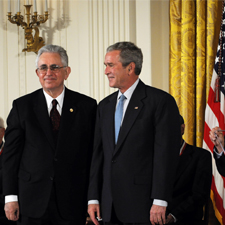 Adam Heller stands beside President George W. Bush