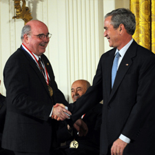 Carlton Grant Willson shakes hands with President George W. Bush