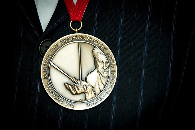 National Medal of Technology and Innovation worn against a person's blazer
